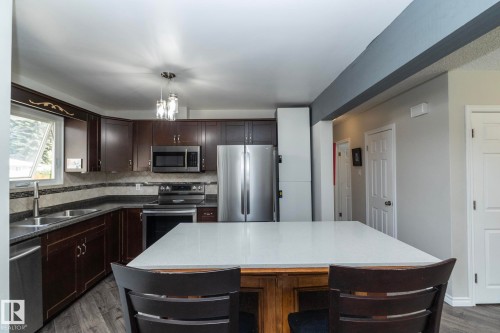 3418 120 Avenue, Edmonton, AB - Indoor Photo Showing Kitchen With Double Sink