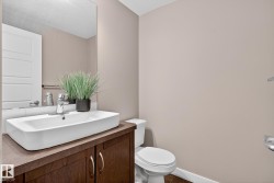 Half bath with vanity and toilet - 