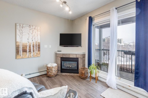 208 10118 95 Street, Edmonton, AB - Indoor With Fireplace