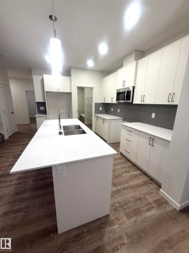 3968 Wren Loop, Edmonton, AB - Indoor Photo Showing Kitchen With Double Sink