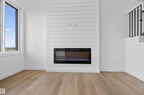 151 Pierwyck Loop, Spruce Grove, AB - Indoor Photo Showing Living Room With Fireplace