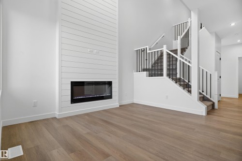 151 Pierwyck Loop, Spruce Grove, AB - Indoor Photo Showing Living Room With Fireplace