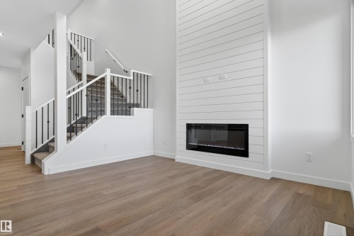 153 Pierwyck Loop, Spruce Grove, AB - Indoor Photo Showing Living Room With Fireplace