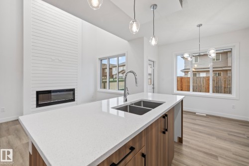 95 Ficus Way, Fort Saskatchewan, AB - Indoor Photo Showing Kitchen With Double Sink