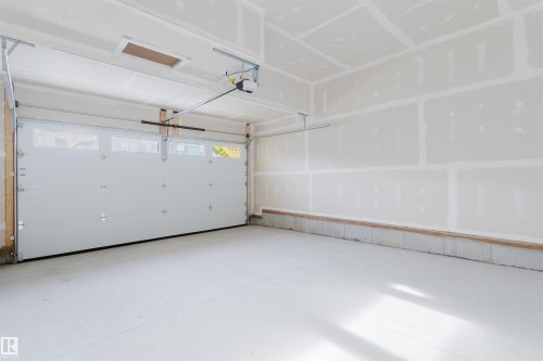 358 Bluff Cove, Leduc, AB - Indoor Photo Showing Garage