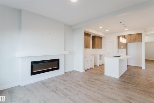 358 Bluff Cove, Leduc, AB - Indoor With Fireplace