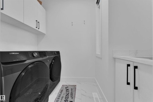 445 Roberts Crescent, Leduc, AB - Indoor Photo Showing Laundry Room