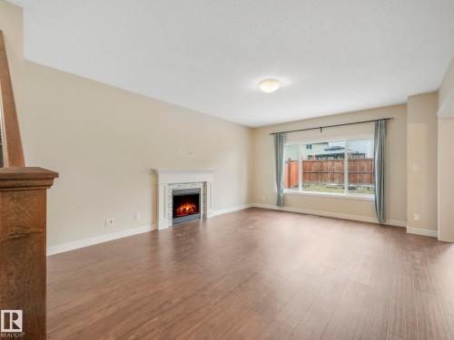 1427 161 Street, Edmonton, AB - Indoor Photo Showing Living Room With Fireplace