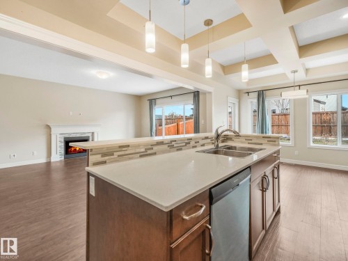 1427 161 Street, Edmonton, AB - Indoor Photo Showing Kitchen With Fireplace With Double Sink