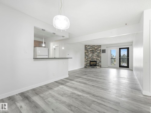 303 10528 29 Avenue, Edmonton, AB - Indoor With Fireplace
