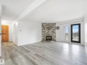 303 10528 29 Avenue, Edmonton, AB  - Indoor Photo Showing Living Room With Fireplace 