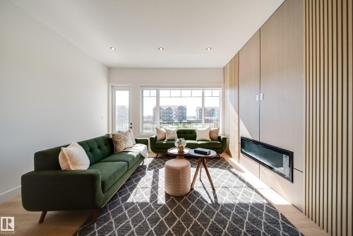 21 Starling Way, Fort Saskatchewan, AB - Indoor Photo Showing Living Room With Fireplace