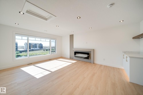 21 Starling Way, Fort Saskatchewan, AB - Indoor Photo Showing Other Room With Fireplace