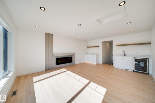 21 Starling Way, Fort Saskatchewan, AB - Indoor Photo Showing Living Room With Fireplace