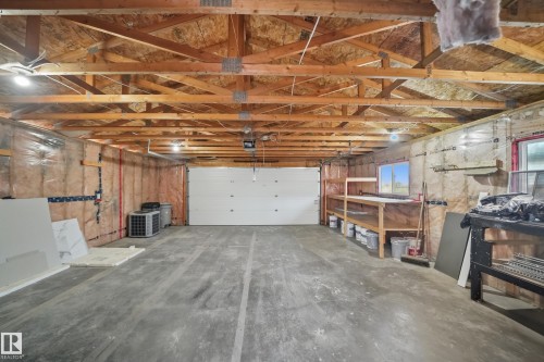 120 Premiere Crescent, Blackfalds, AB - Indoor Photo Showing Garage