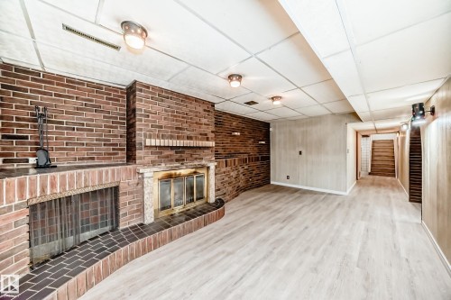 13003 128 Street, Edmonton, AB - Indoor Photo Showing Other Room With Fireplace