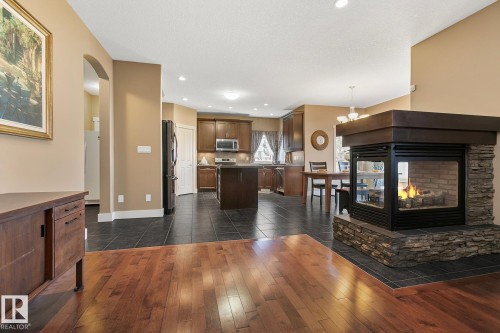1110 Connelly Court, Edmonton, AB - Indoor Photo Showing Living Room With Fireplace