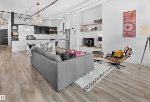 210 10024 Jasper Avenue, Edmonton, AB - Indoor With Fireplace