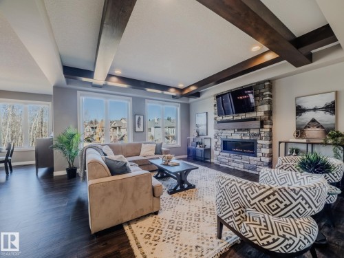 4710 41 Street, Beaumont, AB - Indoor Photo Showing Living Room With Fireplace