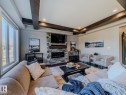 4710 41 Street, Beaumont, AB  - Indoor Photo Showing Living Room With Fireplace 