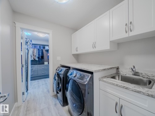 4710 41 Street, Beaumont, AB - Indoor Photo Showing Laundry Room