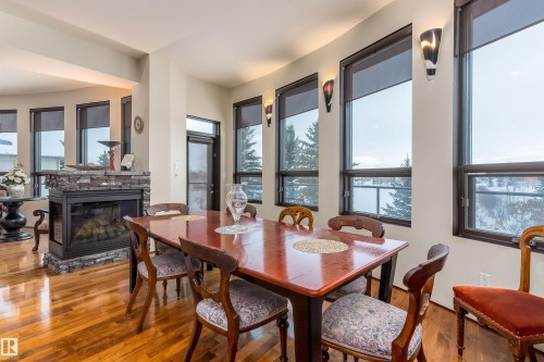 1681 Toane Wynd, Edmonton, AB - Indoor Photo Showing Dining Room With Fireplace