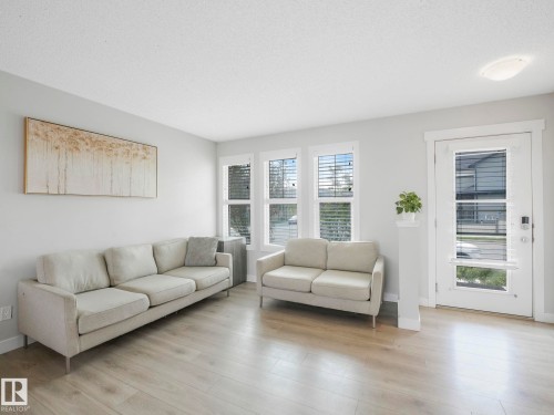 648 Lewis Greens Drive, Edmonton, AB - Indoor Photo Showing Living Room