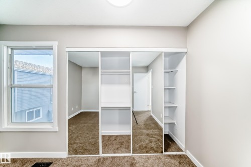 View of closet - 44 4403 Riverbend Road, Edmonton, AB - Indoor