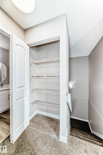 View of closet - 44 4403 Riverbend Road, Edmonton, AB - Indoor