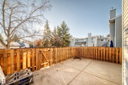 View of patio / terrace with a residential view and a gate - 