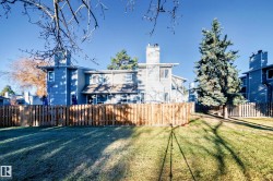 Back of property featuring a chimney - 