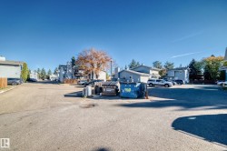 View of asphalt road featuring a residential view - 