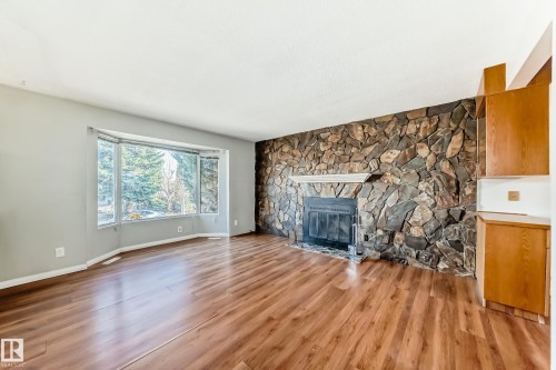 14112 59 Street Nw, Edmonton, AB - Indoor Photo Showing Living Room With Fireplace