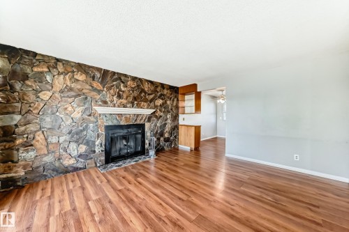 14112 59 Street Nw, Edmonton, AB - Indoor Photo Showing Living Room With Fireplace