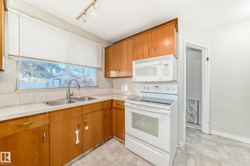 14112 59 Street Nw, Edmonton, AB - Indoor Photo Showing Kitchen With Double Sink