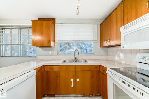 14112 59 Street Nw, Edmonton, AB - Indoor Photo Showing Kitchen With Double Sink