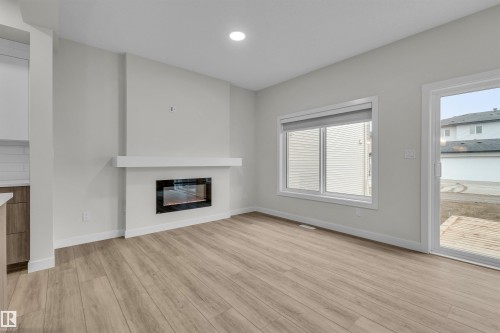 304 Brae Way, Leduc, AB - Indoor Photo Showing Living Room With Fireplace