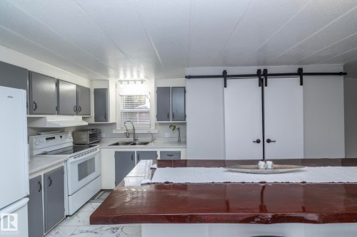 1011 West Mount Crescent, Edmonton, AB - Indoor Photo Showing Kitchen With Double Sink