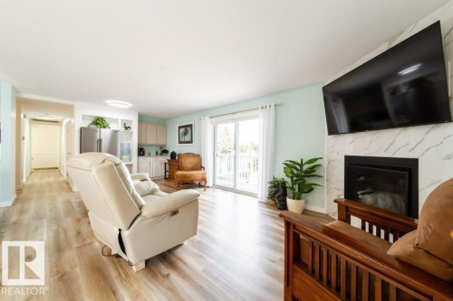 118 2 Street W, Rural Wetaskiwin County, AB - Indoor Photo Showing Living Room With Fireplace