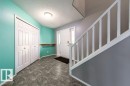 Entrance foyer featuring stairs and a textured ceiling - 6 Lansing Close, Spruce Grove, AB  - Indoor Photo Showing Other Room 