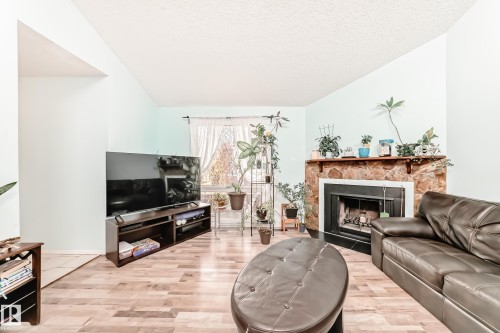 14159 26 Street, Edmonton, AB - Indoor Photo Showing Living Room With Fireplace