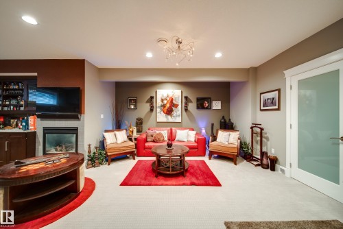 5410 Mcluhan End End, Edmonton, AB - Indoor Photo Showing Living Room With Fireplace