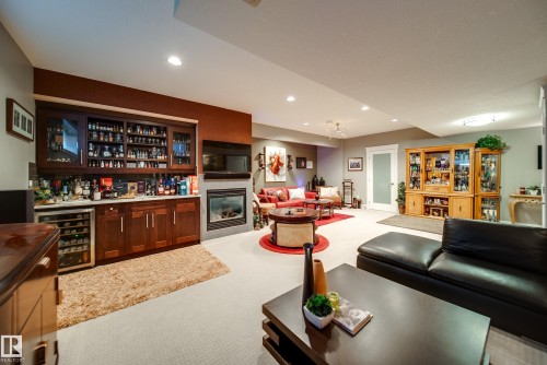 5410 Mcluhan End End, Edmonton, AB - Indoor Photo Showing Living Room With Fireplace