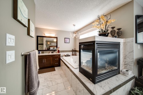 5410 Mcluhan End End, Edmonton, AB - Indoor With Fireplace