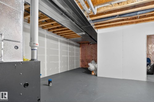 1717 Chapman Way Sw, Edmonton, AB - Indoor Photo Showing Basement