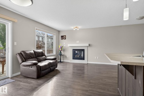 1717 Chapman Way Sw, Edmonton, AB - Indoor Photo Showing Living Room With Fireplace
