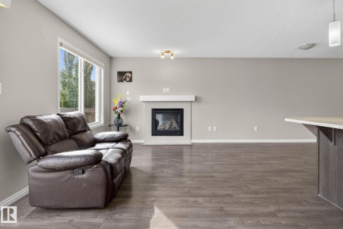 1717 Chapman Way Sw, Edmonton, AB - Indoor Photo Showing Living Room With Fireplace