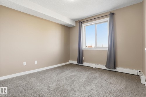 402 11803 22 Avenue, Edmonton, AB - Indoor Photo Showing Other Room