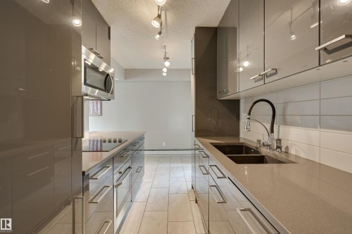 104 10140 115 Street, Edmonton, AB - Indoor Photo Showing Kitchen With Double Sink With Upgraded Kitchen