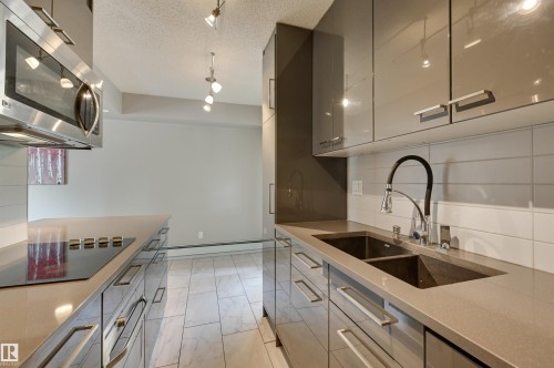 104 10140 115 Street, Edmonton, AB - Indoor Photo Showing Kitchen With Double Sink With Upgraded Kitchen